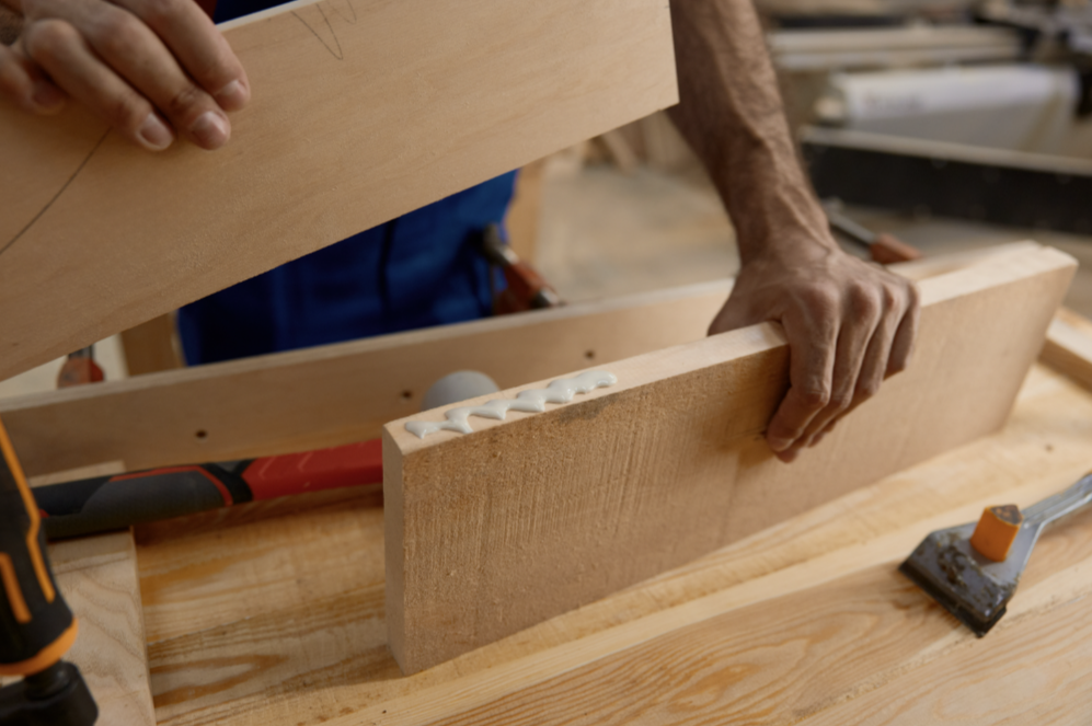 Male artisan worker holding and assembling pieces of wood using glue By NomadSoul The Würth Baer Facts Blog Male artisan worker holding and assembling pieces of wood using glue By Nomad Soul
